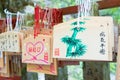 Traditional wooden prayer tablet Ema at Yuki Shrine at Kurama-dera Temple in Kyoto, Japan. The