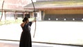 Kyudo practicing bow shooting in Kyoto, Japan.