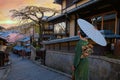 Young Japanese woman in a traditional Kimono dress at Nineizaka or Ninenzaka, an ancient pedestrian road in Kyoto, Japan