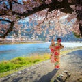 Togetsukyo bridge that crosses the Katsura River with scenic full bloom cherry blossom in spring