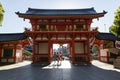 Kyoto, Japan - May 18, 2017: Main gate of the Yasaka jinja shrine in Kyoto with women in kimono
