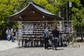 Kyoto, Japan - May 19, 2017: O-mikuji fortune papers tied to a