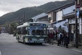 Kyoto city bus pass through Arashiyama stree Royalty Free Stock Photo