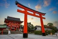 Large red Torii It is the entrance to Fushimi Inari Shrine. At dusk, the twilight sky is beautiful. Royalty Free Stock Photo