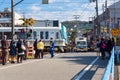 People waiting for Japanese JR Train running pass the road junction