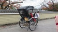 Young Japanese man pulling rickshaw