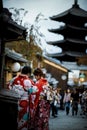 Kyoto japan - november10,2018 : japanese woman wearing tradition kimono walking in yazaka shrine street one of most popular Royalty Free Stock Photo