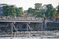 Kyoto, Japan - November 17, 2017 :Many tourists wallking on Togetsukyo bridge to cross Hozu-gawa river during autumn season in Ar