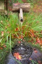 Stone washbasin or font for cleaning hands or Chozubachi