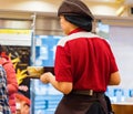 KYOTO, JAPAN - NOVEMBER 7, 2017: A waitress in a cafe. Close-up. Back view.