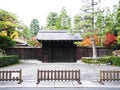 He wooden old entrance door, Japanese culture in autumn season Royalty Free Stock Photo