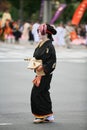 The wife of Nakamura Kuranosuke in the black elegant kimono at Jidai Festival. Kyoto. Japan