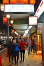 People walking at sidewalk of Gion district in Kyoto, Japan Royalty Free Stock Photo