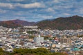 Kyoto residence area with multiple colour mountain background Royalty Free Stock Photo