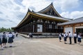 Kyoto, Sanjusangen-do Buddhist temple. Students in front of the temple.