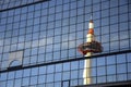 Kyoto Tower mirrored by glass steel of Kyoto railway station Japan Royalty Free Stock Photo