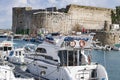 KYRENIA, CYPRUS - WINTER, 2019: Kyrenia castle. Sea pier with boats, ships and yachts. Historical and tourist place Royalty Free Stock Photo