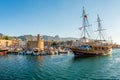 Kyrenia (Girne), CYPRUS - JULY 5: Frigate in Kyrenia harbour on Royalty Free Stock Photo