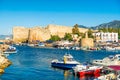 Kyrenia harbour with medieval castle on a background. Kyrenia (Girne), Cyprus Royalty Free Stock Photo