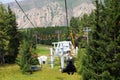 Kyrgyzstan, Karakol ski resort - August 22, 2022. Summer mountain landscape high in the mountains. Tall trees of Christmas trees,