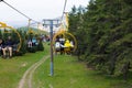 Kyrgyzstan, Karakol ski resort - August 22, 2022. Summer mountain landscape high in the mountains. Tall trees of Christmas trees,