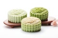 Traditional Chinese skin mooncakes for mid autumn festival with fruit, taro and matcha paste