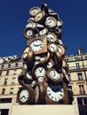 L`Heure de Tous monument, Art sculpture made of clocks at Saint-Lazare train station, Paris France. Popular tourist landmark as