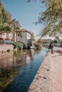 L`Isle-sur-la-Sorgue, Avignon, Vaucluse, Provence-Alpes-Cote d`Azur, France, September 24, 2018: Sunny autumn on the streets