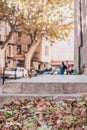 L`Isle-sur-la-Sorgue, Avignon, Vaucluse, Provence-Alpes-Cote d`Azur, France, September 24, 2018: Sunny autumn on the streets