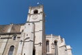 L`Isle-sur-la-Sorgue city view of the facade and clock tower of the main catholic church Notre Dame des Anges france Royalty Free Stock Photo