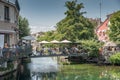 Unidentified diners enjoying Sunday brunch in L`Isle- sur-la-Sorgue, France