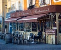 L`isle sur la sorgue ,Vaucluse ,France.1-16-2020  translation.Cafe antique hunter restaurant Royalty Free Stock Photo