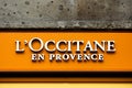 L`occitane en Provence logo on a wall