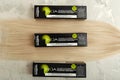 L`oreal professionnel Paris Inoa coloration. Set of professional hair dye in boxes for hairdressers with strand of blonde hair on