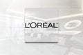 L oreal on glossy office wall realistic texture