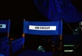 Closeup of isolated movie film empty directors chair of Ben Kingslay, dark black background