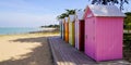 La Bree-les-Bains village wooden brightly coloured beach huts on West atlantic beach french oleron island Royalty Free Stock Photo