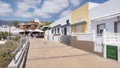 Boardwalk lined with traditional homes now converted into restaurants, La Caleta, Tenerife, Canary Islands, Spain