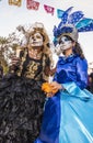 La Catrina visits each altar lighting a candle