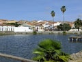 La Coronada fishing pond with village view Royalty Free Stock Photo