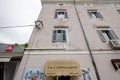 La Cotonniere Logo in front of their shop for Koper.