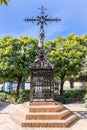 La Cruz de las Sierpes, the Cross of the Serpents, from 1692 sited in the Plaza de Santa Cruz, Royalty Free Stock Photo