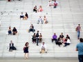 La Defense, Paris,, France, August 20 2018: people sitting and walking on the stairs of the Grand Arch Royalty Free Stock Photo