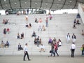 La Defense, Paris, France, August 20 2018: people sitting and walking on the stairs of the Grand Arch Royalty Free Stock Photo