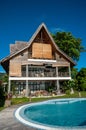 house on a tropical place with swimming pool Royalty Free Stock Photo