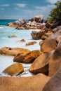La Digue, Seychelles Islands. Granite rocks and turquoise ocean at beautiful Anse Cocos beach