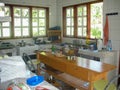 Interior of a kitchen real house in tropical place with sunlight