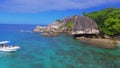 LA DIGUE, SEYCHELLES - SEPTEMBER 2017: Small boat anchored along a beautiful beach