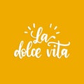 La Dolce Vita translated from Italian The Sweet Life handwritten phrase on yellow background. Vector inspirational quote Royalty Free Stock Photo