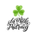 La Fheile Padraig translated from Irish Saint Patricks Day handwritten phrase. Drawn image of clover leaf.